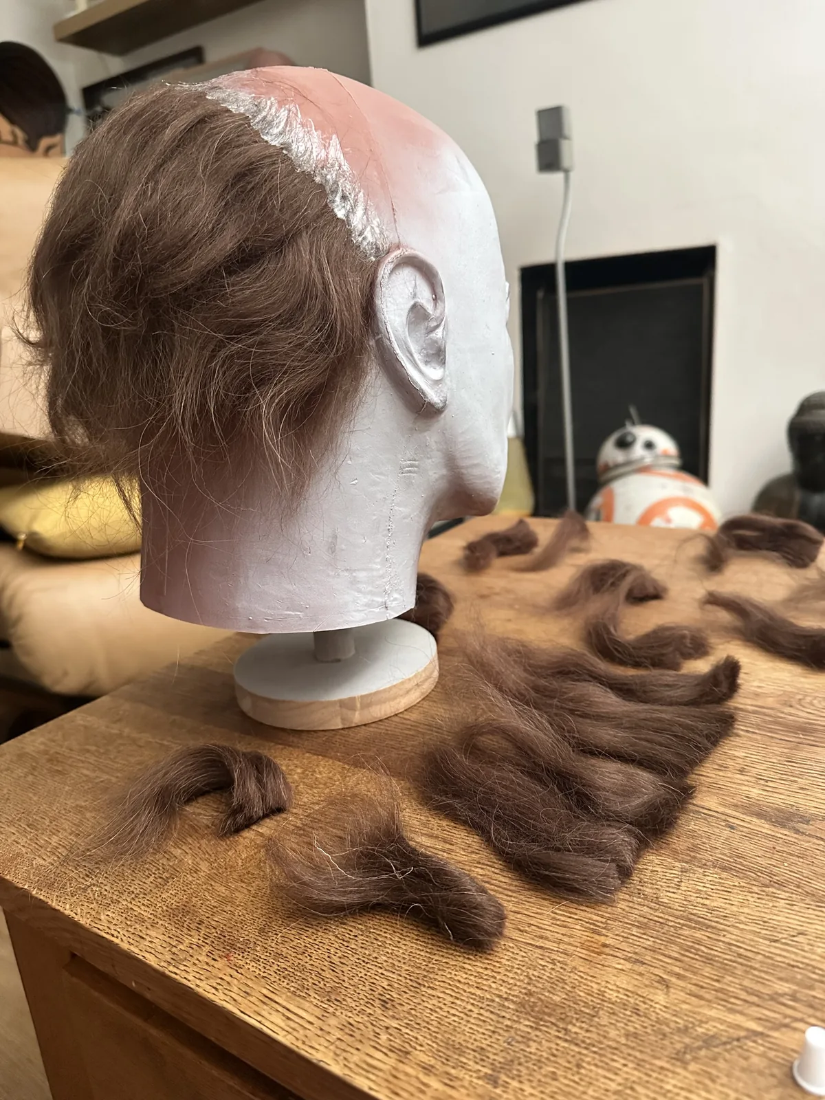 Dark Labs Cosmic Shape 78 mask with mohair blend fibre being laid onto the back of the head