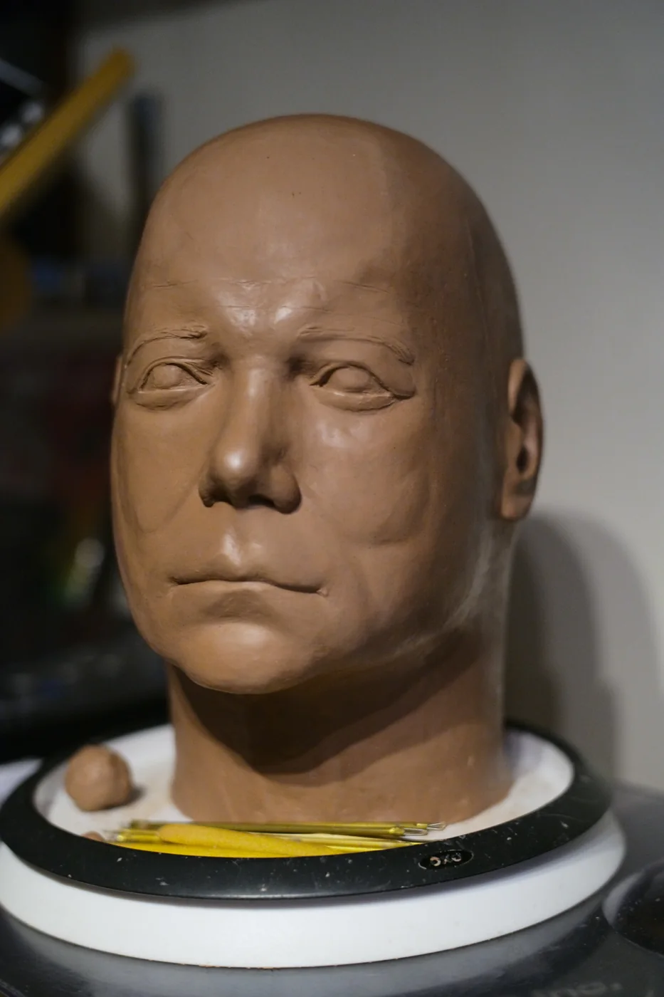 Dark Labs Kirk sculpt close angle showing the eye, cheek and mouth shape in clay