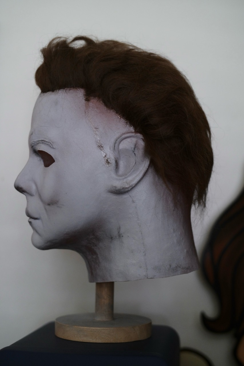 Dark Labs Halloween Begins: Left-facing profile showing the ear, jawline and hair.